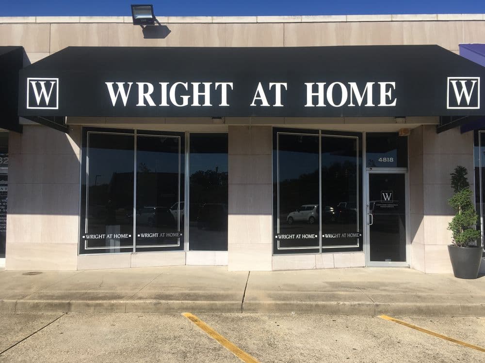 Wright At Home store front with large black awning and glass windows, located at 4818.