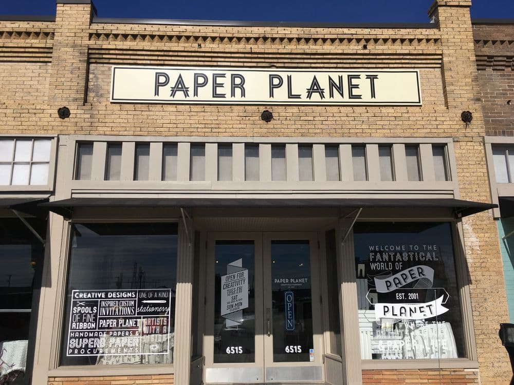 Paper Planet storefront with creative designs, arts supplies, and welcoming entrance.