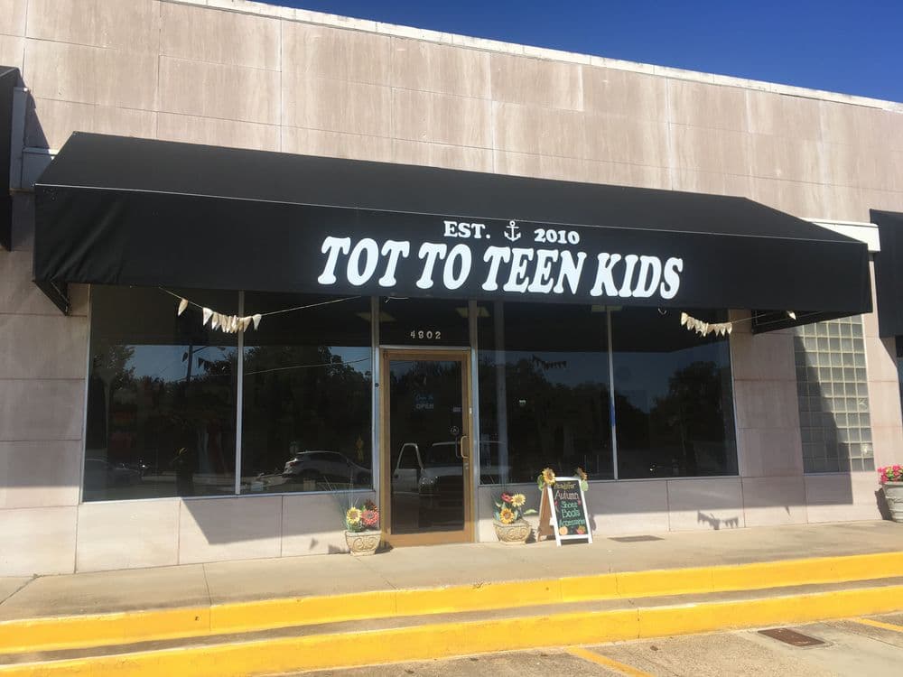 Storefront of Tot to Teen Kids, children's clothing shop established in 2010, located at 4802.